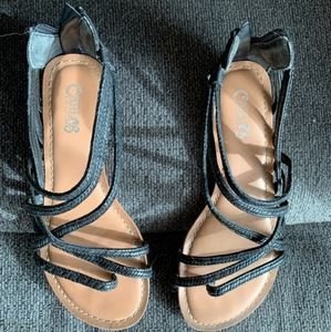Size 6 Carlos Santana black sandals.